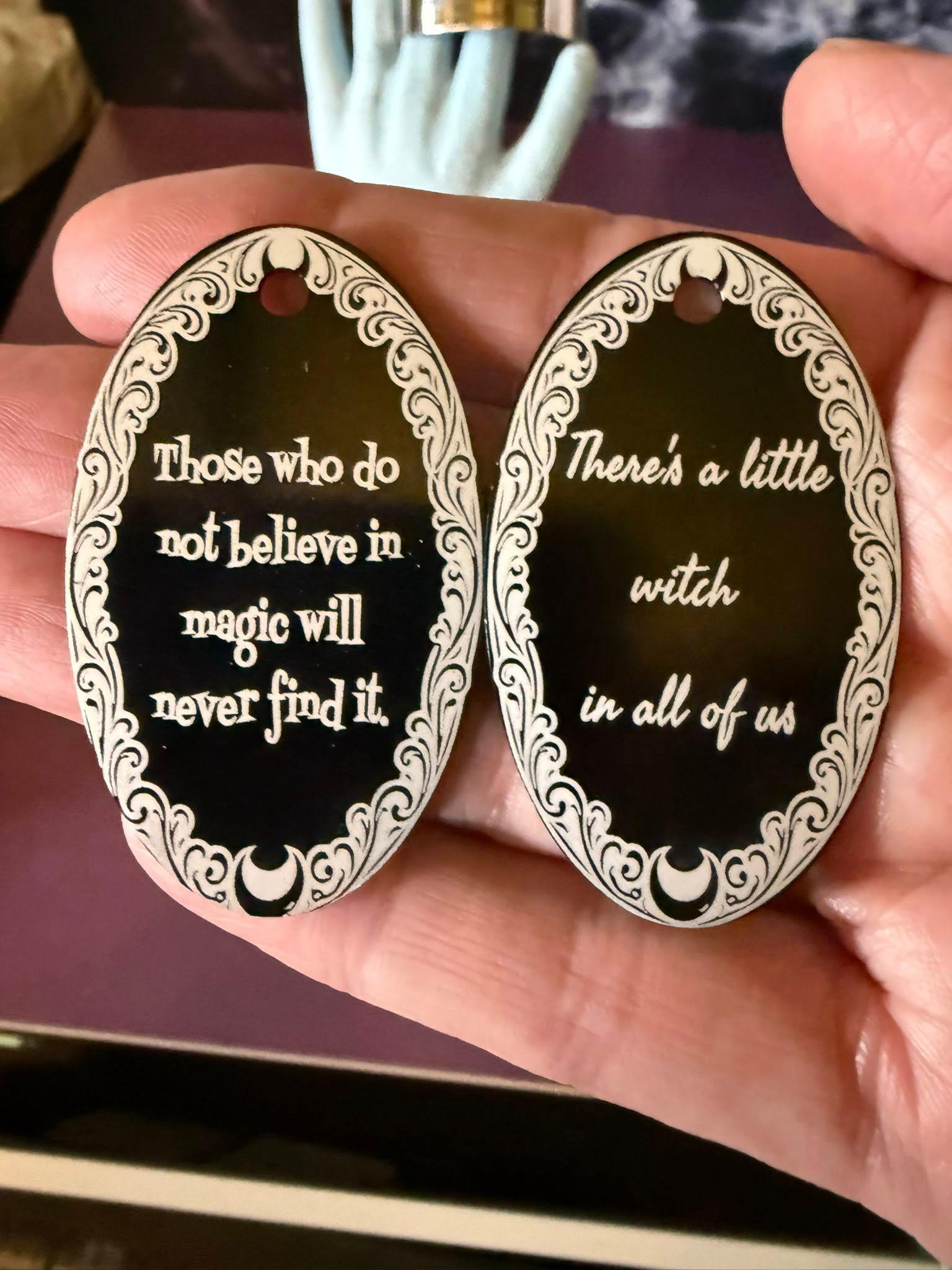 Black engraved magic quote pendants by Loren Morris, Primitive Witchery