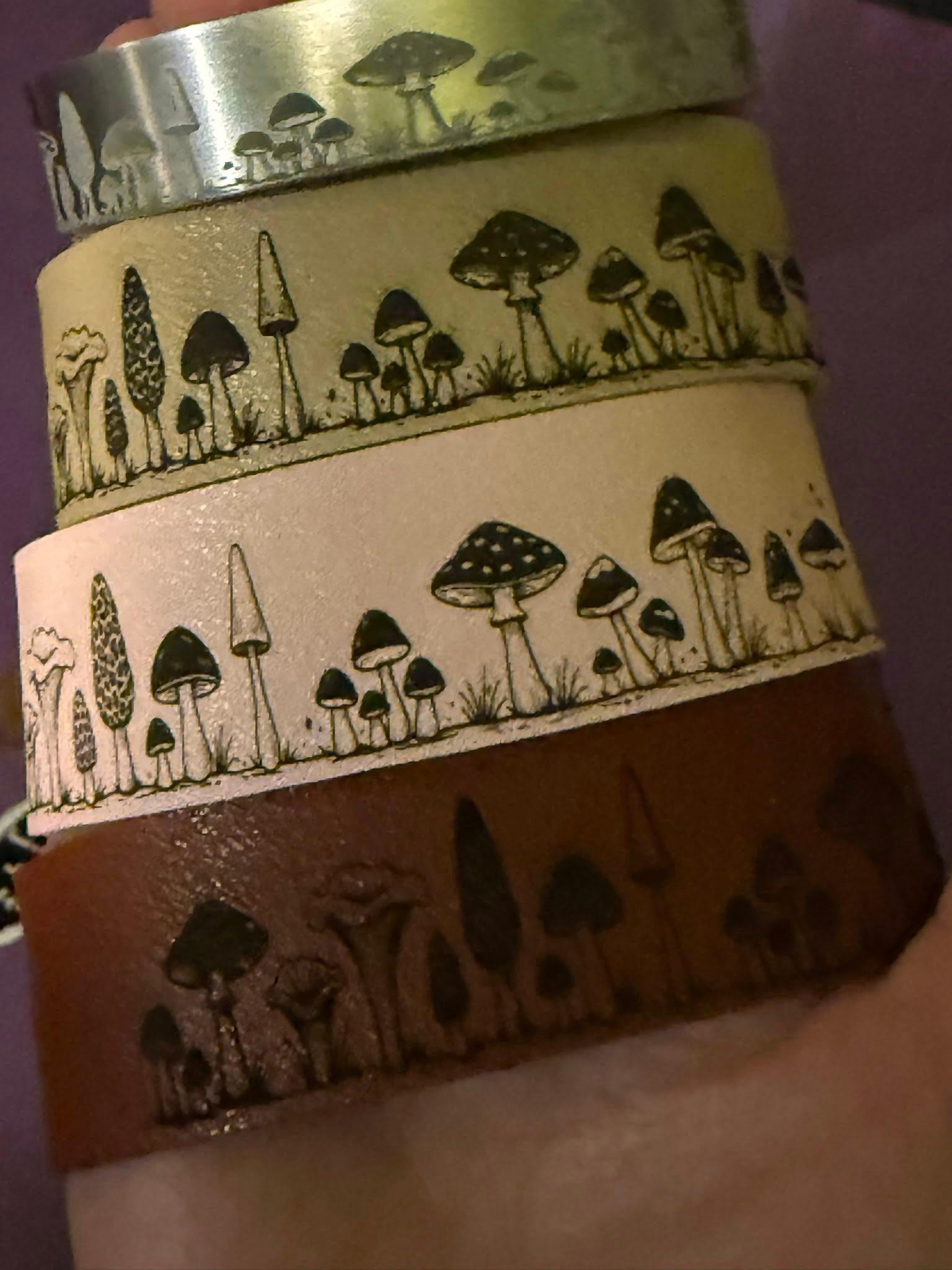 Hand-stamped mushroom leather cuffs in three colorways by Loren Morris, Primitive Witchery