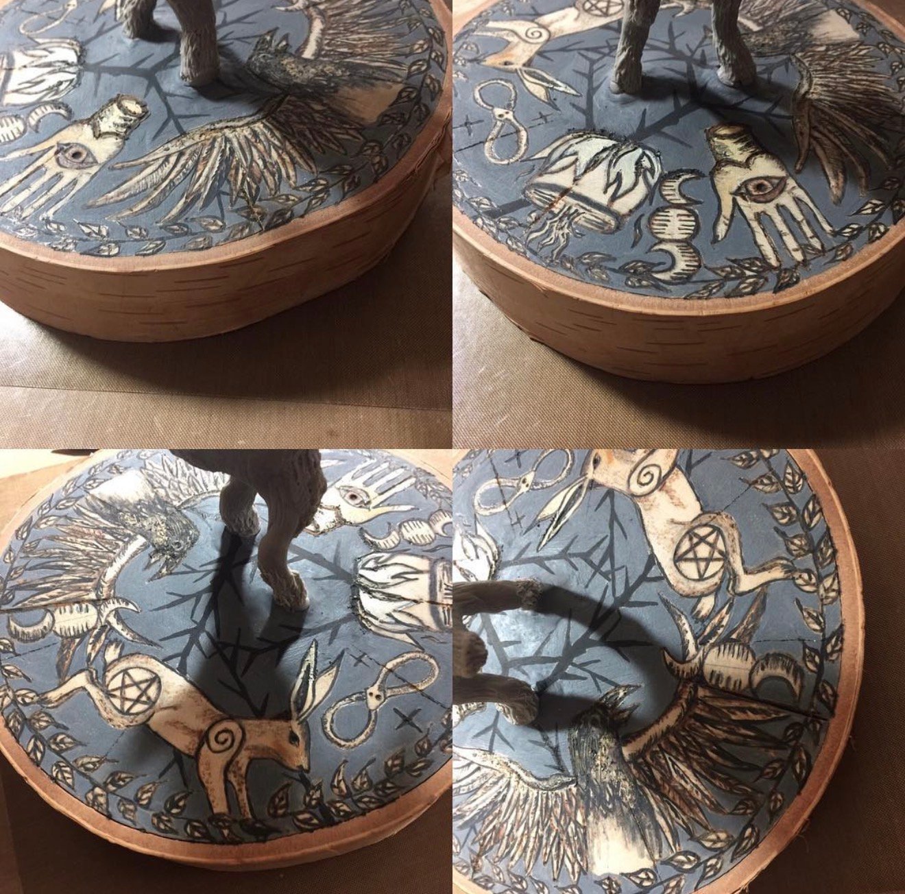 Close-up of hand-painted occult folk art base of Black Phillip sculpture by Loren Morris