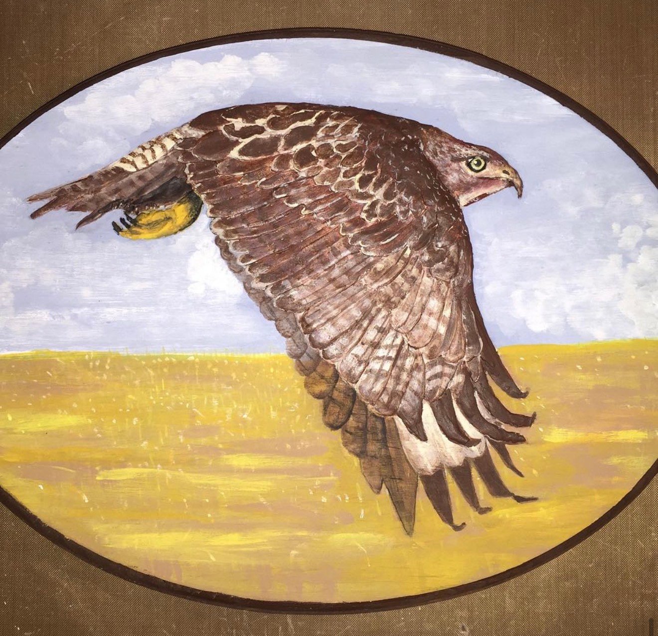 Acrylic painting of a hawk in flight over golden fields by Loren Morris